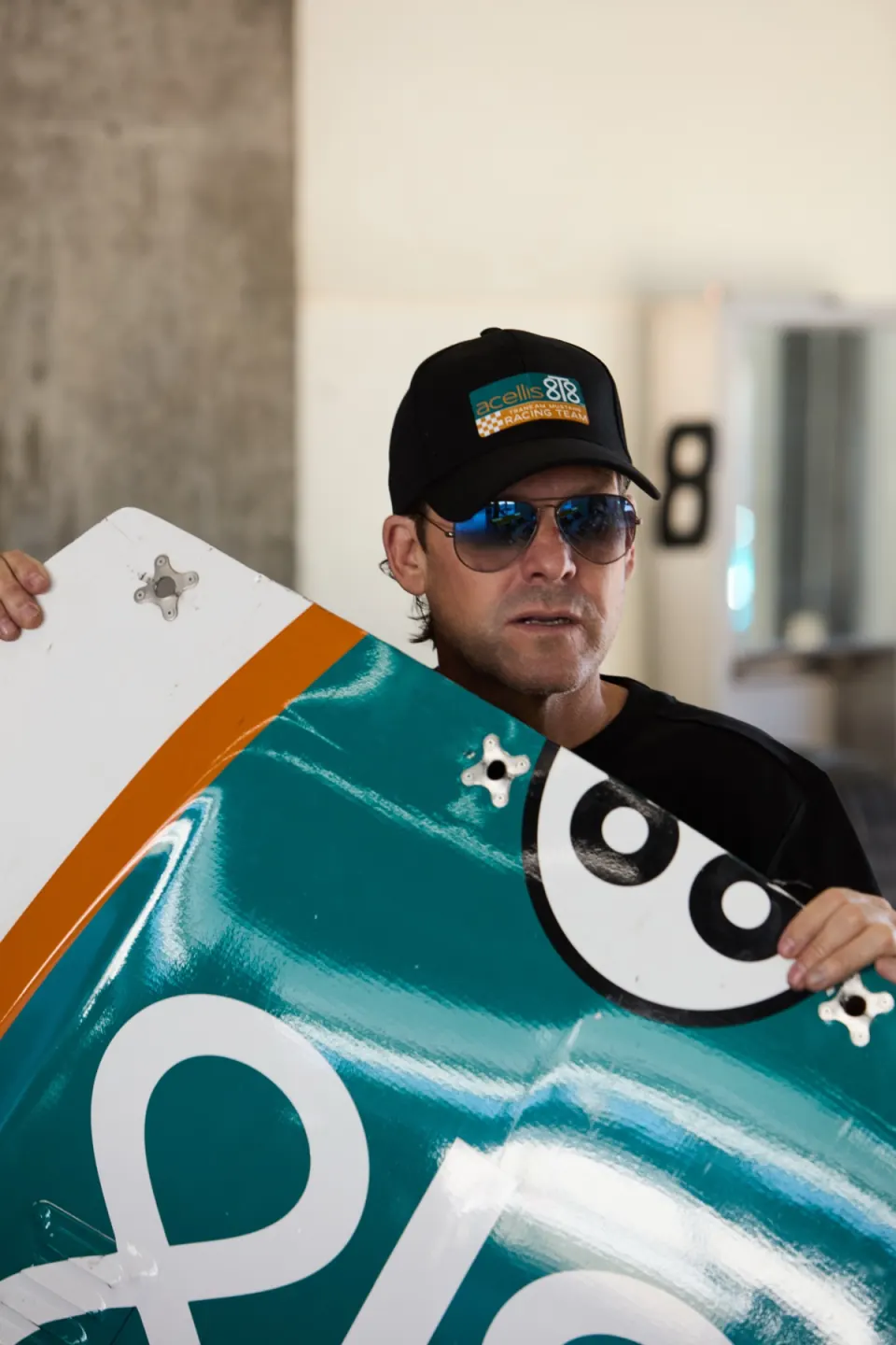 Stanton Barrett beside the 8T8 Mustang