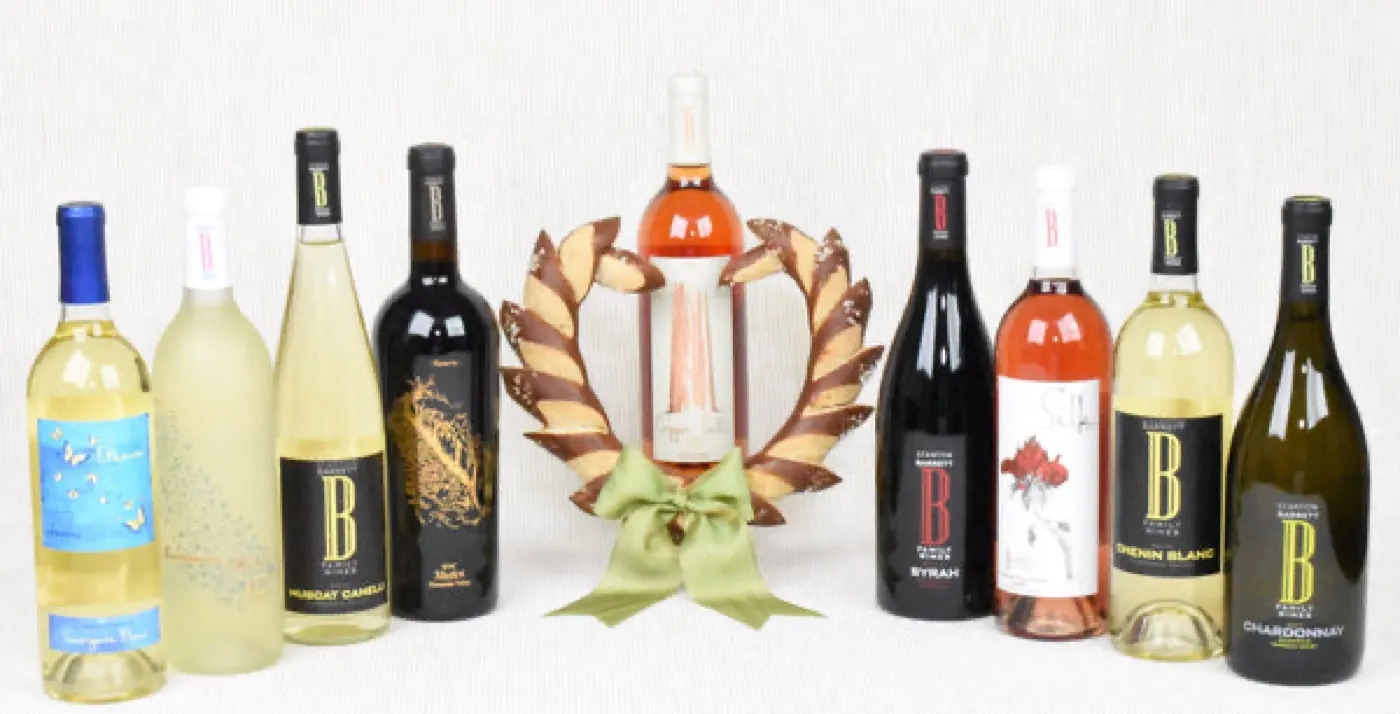 The Stanton Barrett Winery bottle lineup with an award medal